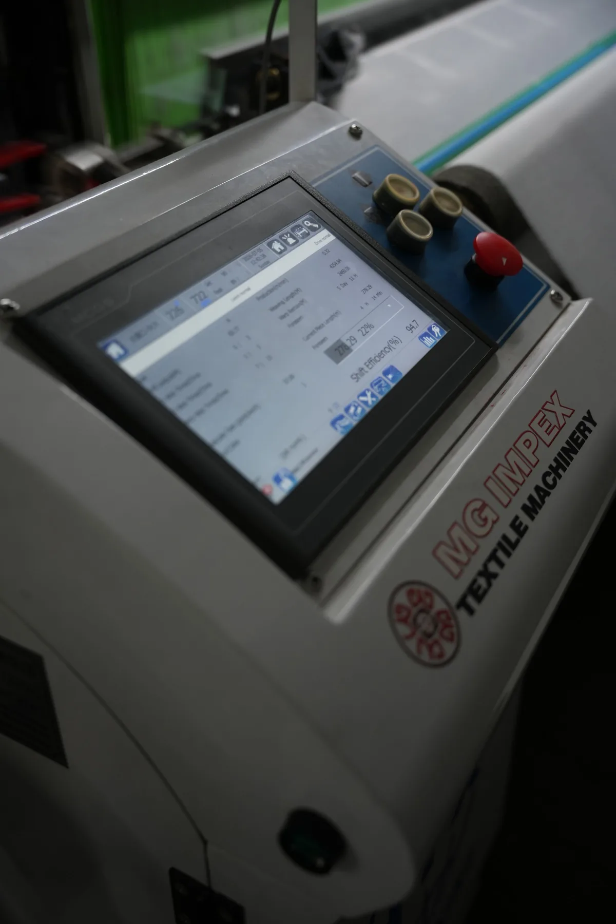 Loom touchscreen showing live production and efficiency figures